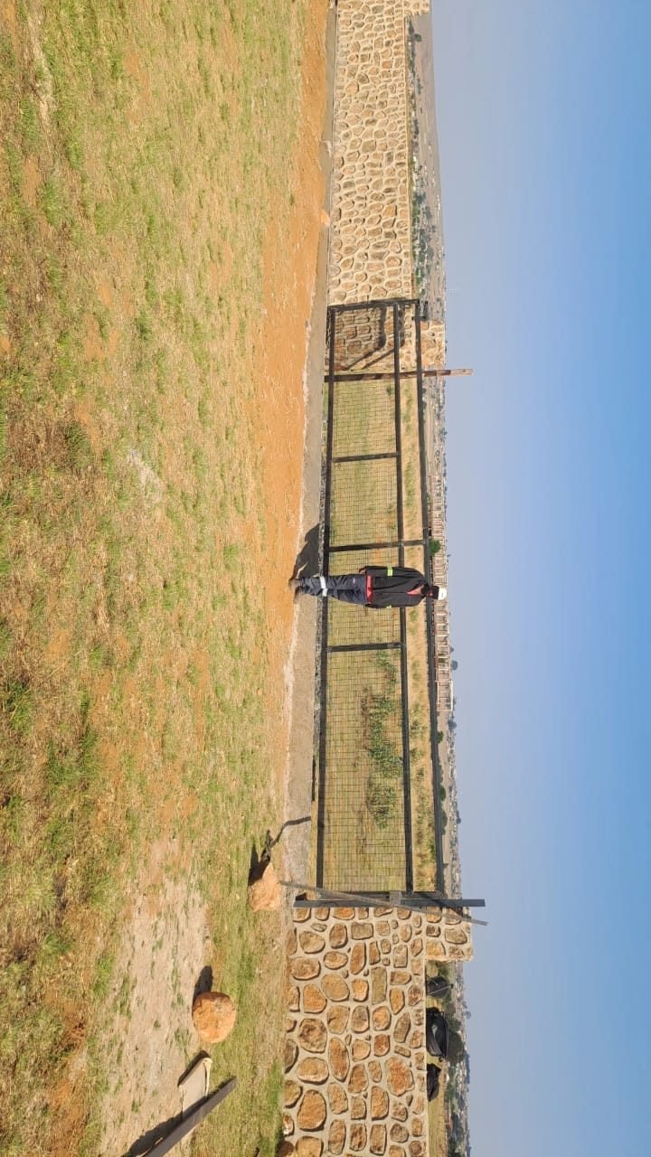 Steel fence line with matching gate
