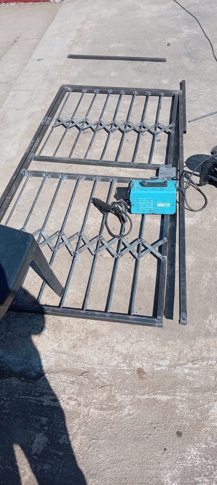 Trellis gate panels fabricated in the workshop